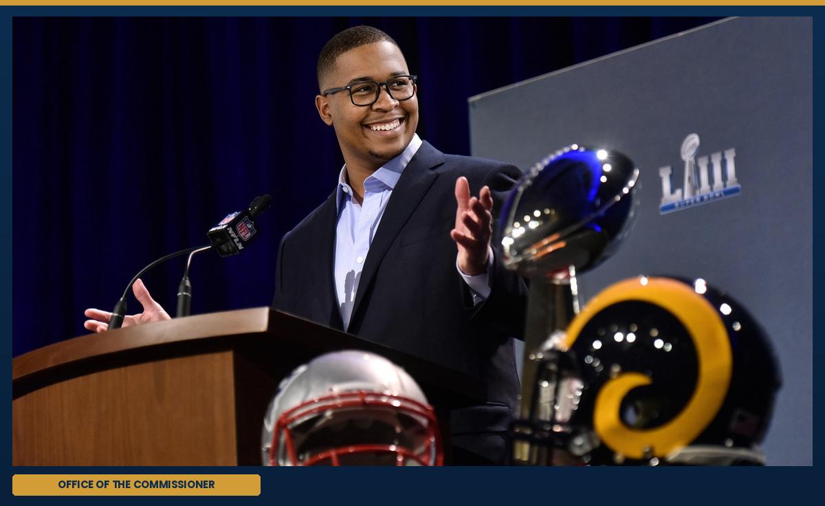 The commissioner, at the podium.