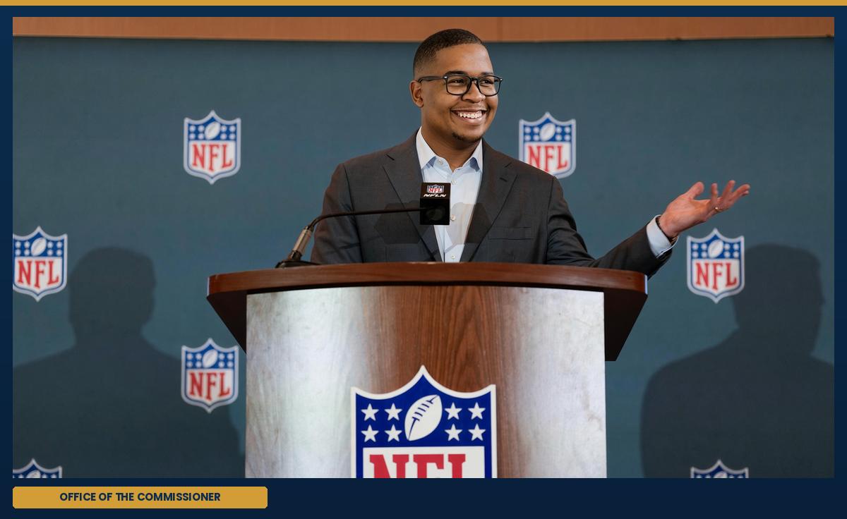 The commissioner, at the podium.