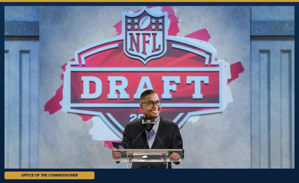 The commissioner, at the podium.