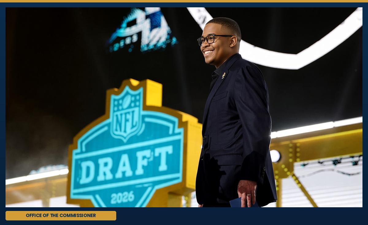 The commissioner, at the podium.